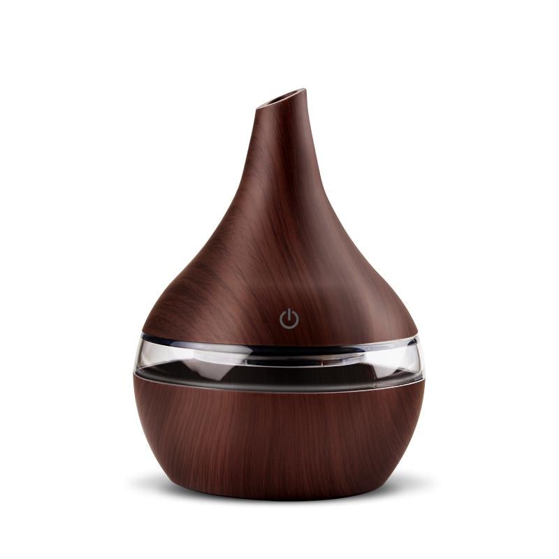 Wood grain USB aromatherapy humidifier, designed to enhance air quality and provide soothing mist.