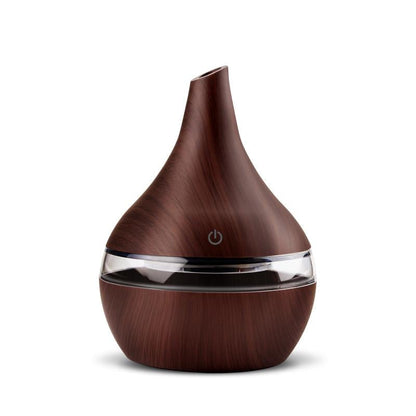 Wood grain USB aromatherapy humidifier, designed to enhance air quality and provide soothing mist.